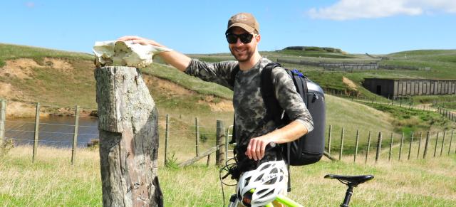 image of Matt holding skeleton head 