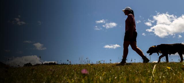 Woman and dog walking