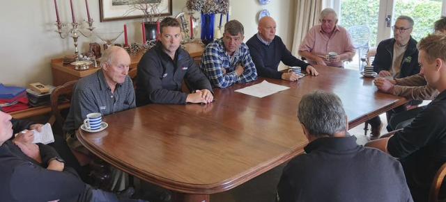 farmers talking around a table