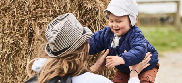 image of toddler and mother on-farm