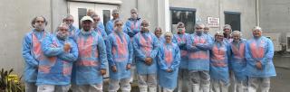 image of Gen Next graduates entering meat processing facility