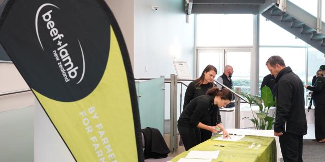 image of staff at registration desk